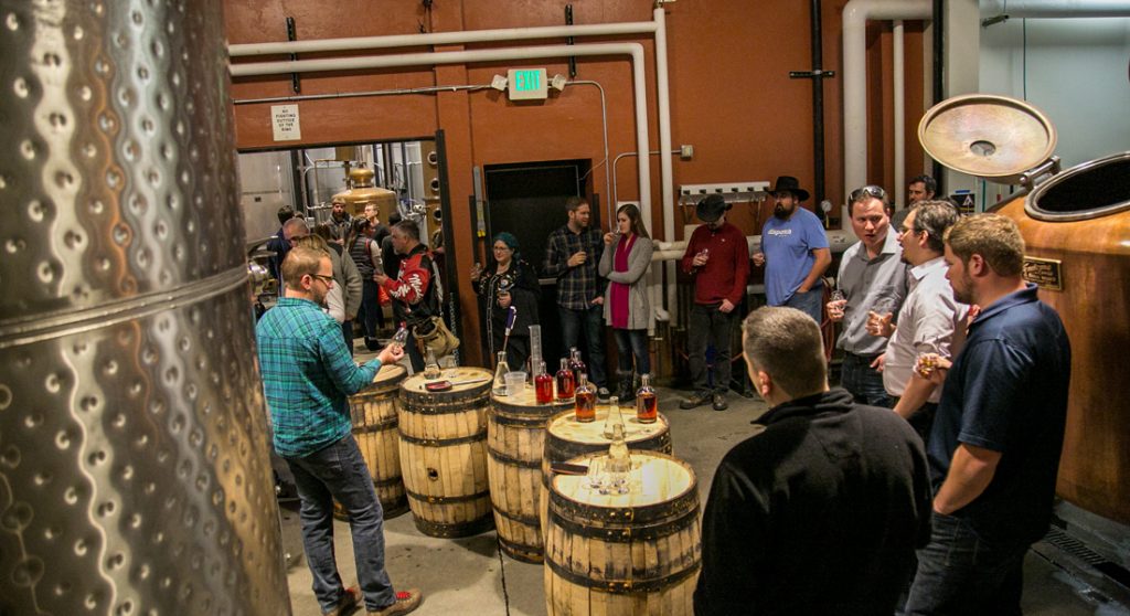 people on distillery tour