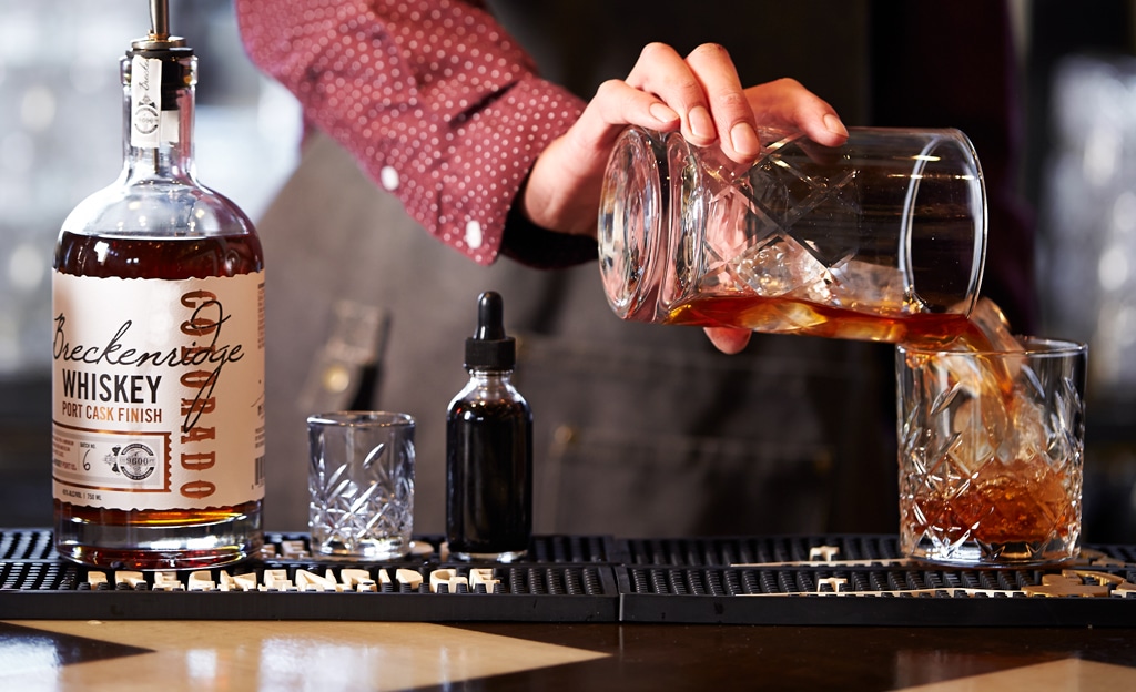bartender making cocktail